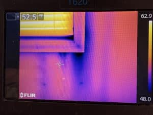 Infrared thermal imaging camera being used during a New Jersey home inspection to detect hidden moisture and insulation issues