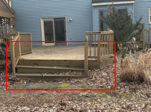 deck wood rot risk at lower framing near ground with potential structural issues